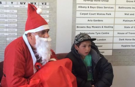 Ian Mellett - an Auckland Lawyer, wearing his Santa Suite at a local community gathering for South Aricans living in New Zeland.